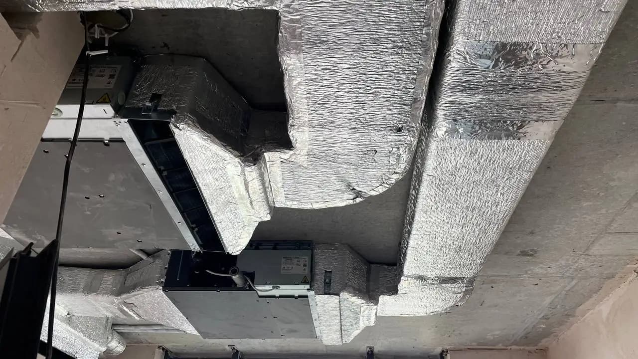 Installation of a branched system of foil-insulated Ventall air ducts in an apartment at the Pecherski Lypky residential complex in Kyiv.