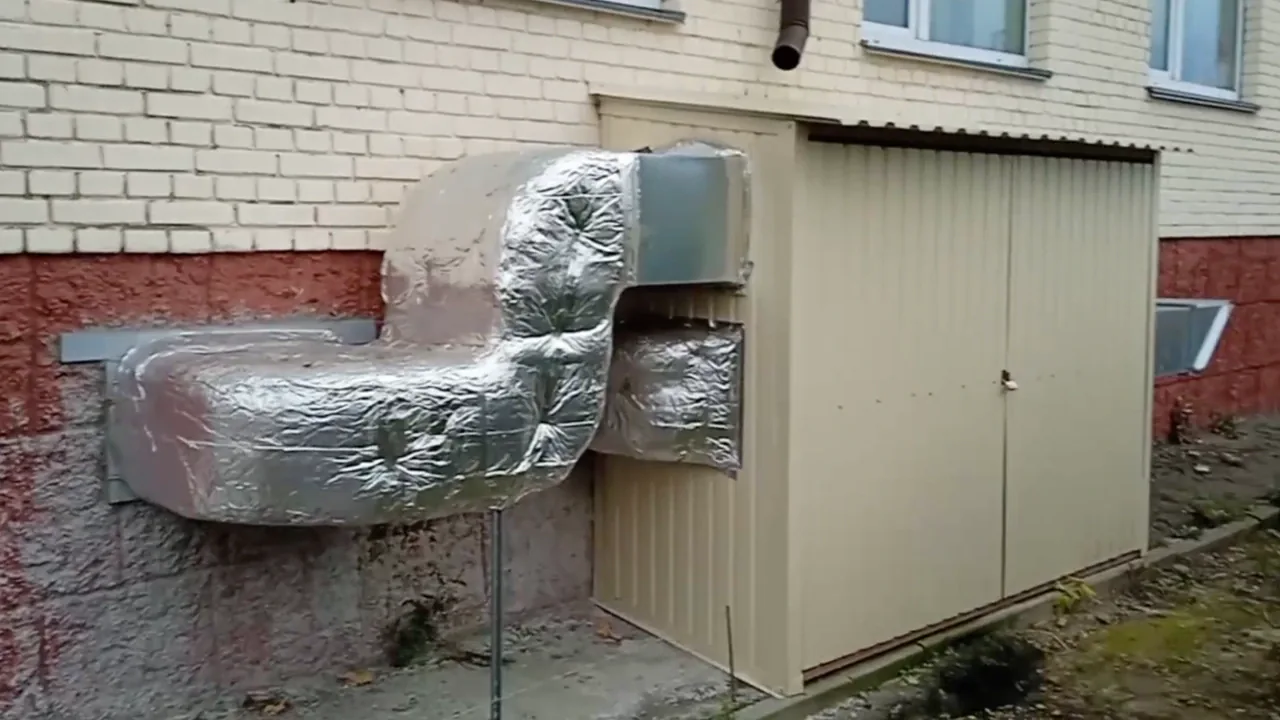 Supply and exhaust units and duct network on the facade of the school in Kniazhychi.